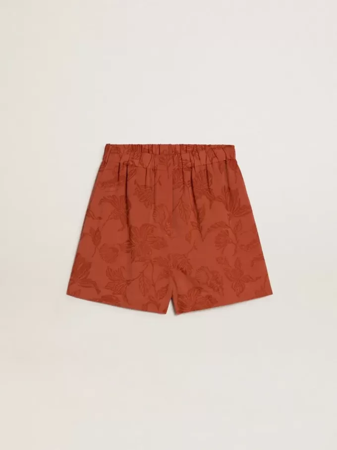 Damshorts i tegelröd jacquard med marint blommönster