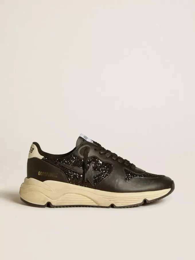 Damskor Running Sole i svart glitter med läderstjärna och nubuckklackflik Damskor Running Sole i svart glitter med läderstjärna och nubuckklackflik