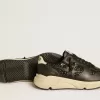 Damskor Running Sole i svart glitter med läderstjärna och nubuckklackflik Damskor Running Sole i svart glitter med läderstjärna och nubuckklackflik