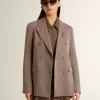 Dubbelknäppt damblazer i beige chevronullblandning Dubbelknäppt damblazer i beige chevronullblandning