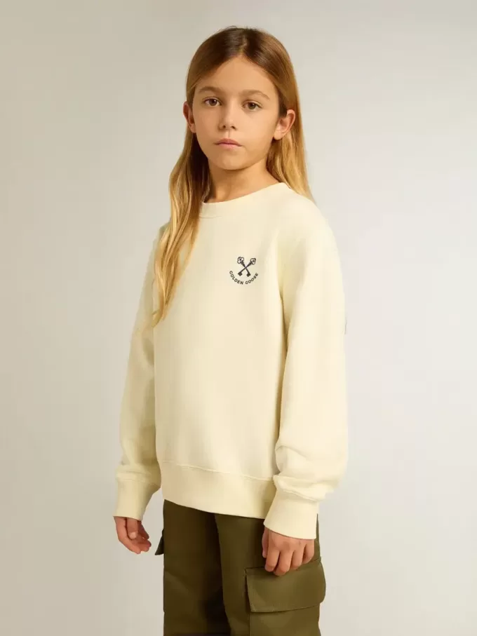 Flick-T-shirt i slitet vitt med broderi på framsidan och tryck på baksidan