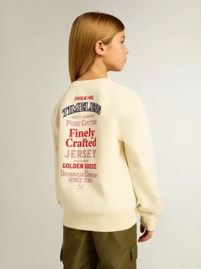 Flick-T-shirt i slitet vitt med broderi på framsidan och tryck på baksidan