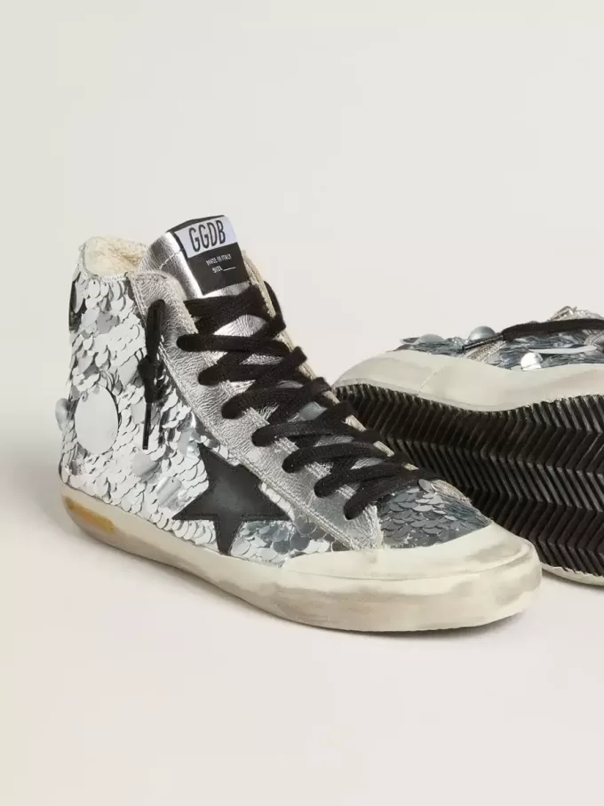 Francy för dam i nylon med silverpaljetter över hela ytan och svart läderstjärna Francy för dam i nylon med silverpaljetter över hela ytan och svart läderstjärna