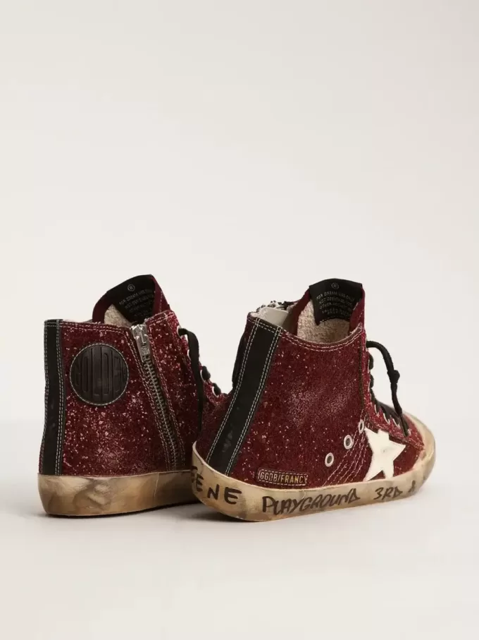 Francy Penstar i burgundy glitter med vit läderstjärna Francy Penstar i burgundy glitter med vit läderstjärna