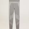 Grå melerade leggings för dam med blandade sömmar Grå melerade leggings för dam med blandade sömmar