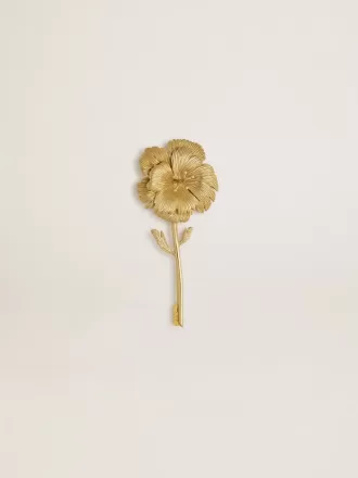 Guldnål med blommönster