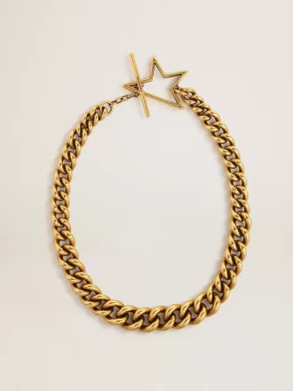 Halsband i antikguld med avtagande kedja och stjärnformad lås Halsband i antikguld med avtagande kedja och stjärnformad lås