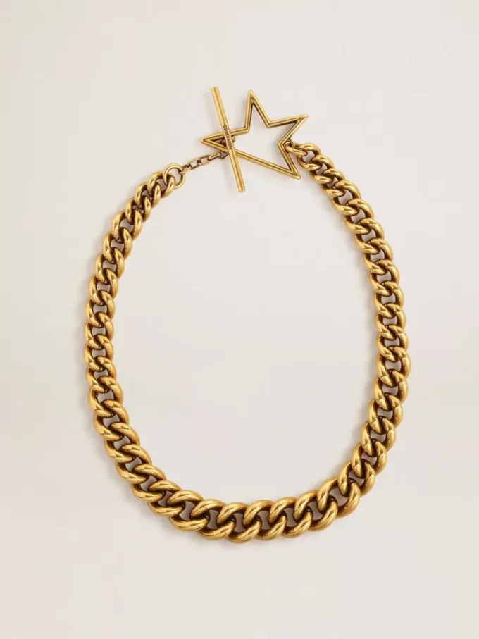 Halsband i antikguld med avtagande kedja och stjärnformad lås Halsband i antikguld med avtagande kedja och stjärnformad lås