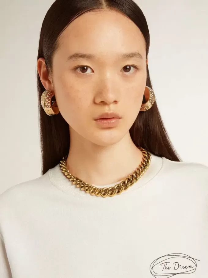 Halsband i antikguld med avtagande kedja och stjärnformad lås Halsband i antikguld med avtagande kedja och stjärnformad lås