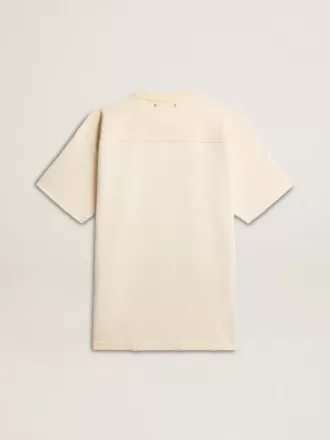 Herr-T-shirt i bomull i vintagevit med rå kant framtill.