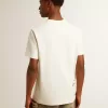 Herr-T-shirt i åldrad vit bomull med tryck och broderi