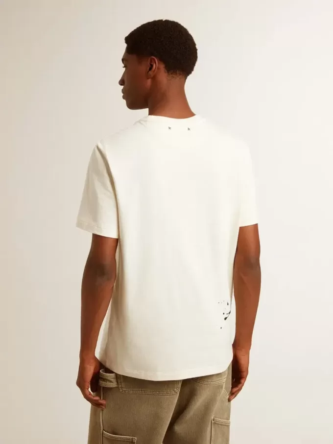 Herr-T-shirt i åldrad vit bomull med tryck och broderi