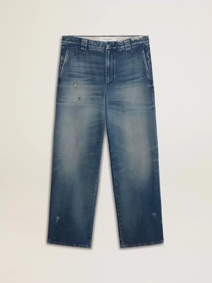 Herrchinos i denim med slitna detaljer