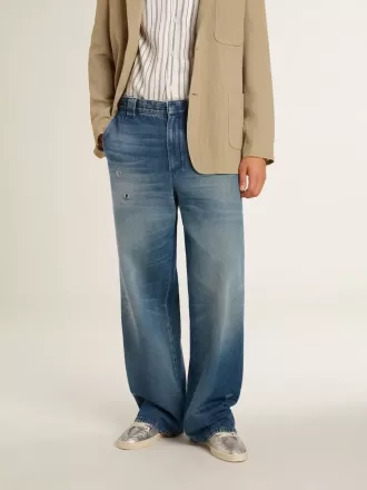Herrchinos i denim med slitna detaljer