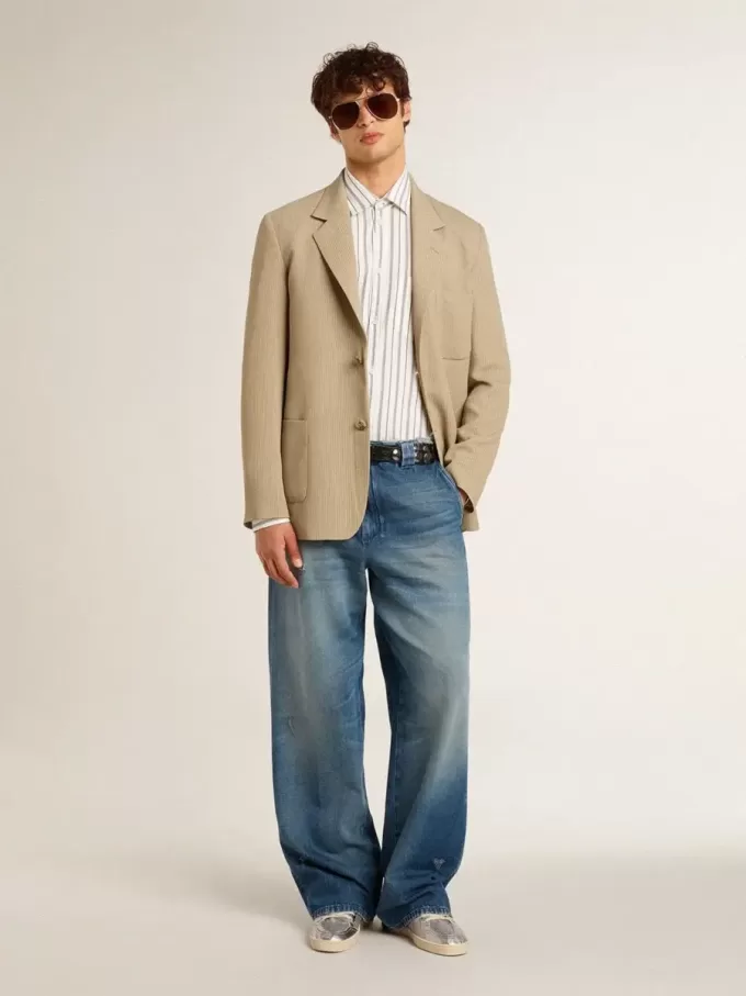Herrchinos i denim med slitna detaljer