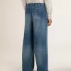 Herrchinos i denim med slitna detaljer