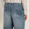 Herrchinos i denim med slitna detaljer