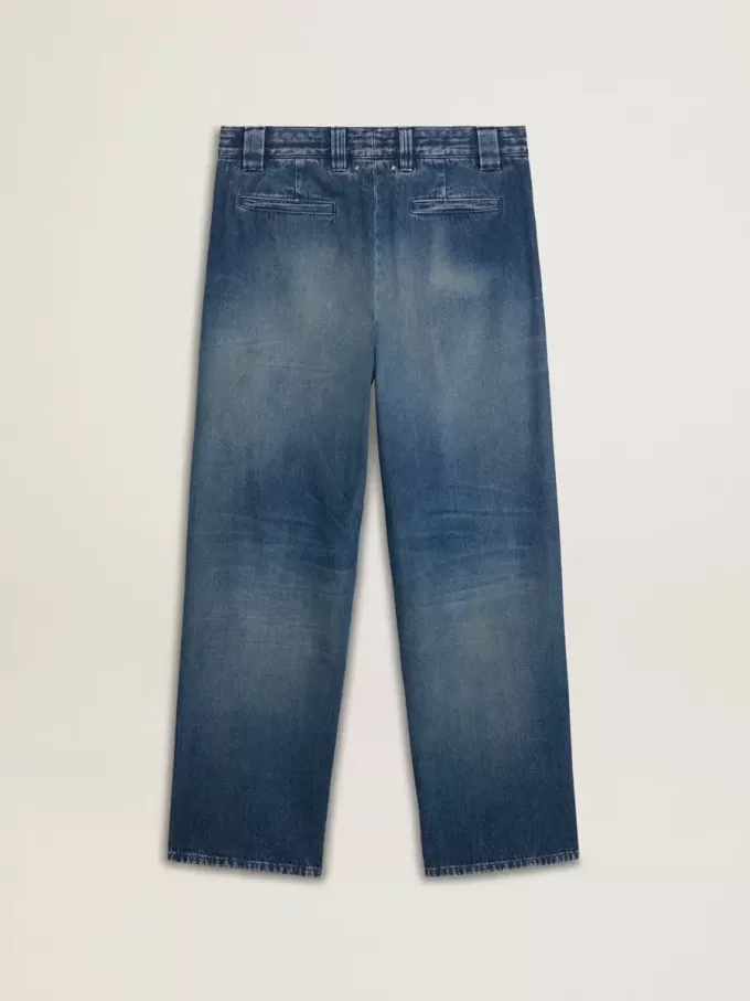 Herrchinos i denim med slitna detaljer