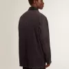Herrjacka i denim med slitna detaljer och läderkrage Herrjacka i denim med slitna detaljer och läderkrage