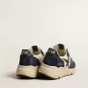Herrskor Running Sole i svart och beige nappa med svart stjärna och hälflik Herrskor Running Sole i svart och beige nappa med svart stjärna och hälflik