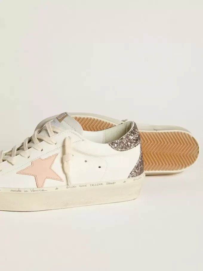 Hi Star i vitt nappa med rosa läderstjärna och glitterhälflik Hi Star i vitt nappa med rosa läderstjärna och glitterhälflik