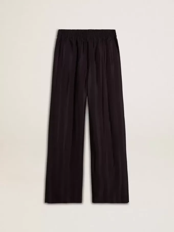 Joggingbyxor för damer med slits vid ankeln Joggingbyxor för damer med slits vid ankeln