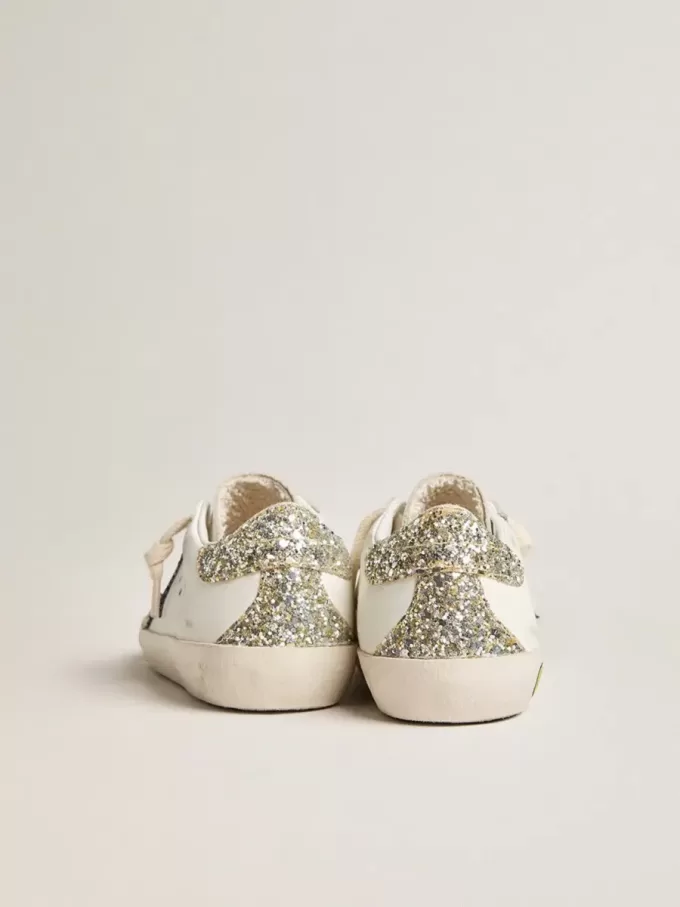 Junior Super-Star i läder med glitterstjärna och hälflik