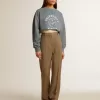 Kort sweatshirt i babyblått med slitna detaljer