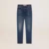 Korta, utsvängda jeans för damer med medium tvätt