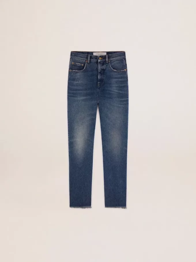 Korta, utsvängda jeans för damer med medium tvätt