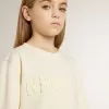 Krämfärgad sweatshirt för flickor med patch-text