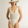 Krokat bodysuit för dam i vit bomull Krokat bodysuit för dam i vit bomull
