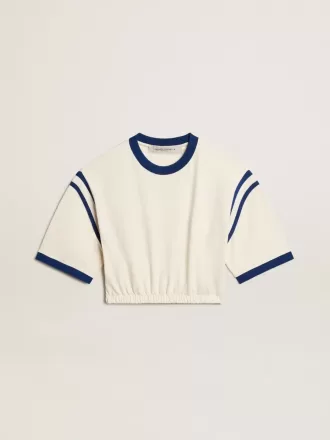 Åldrad vit bomullst-shirt med text på baksidan