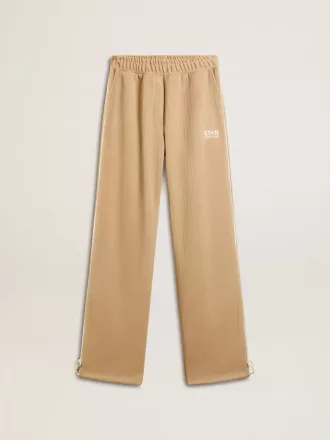 Ljusbeige joggingbyxor för damer med vitt logo