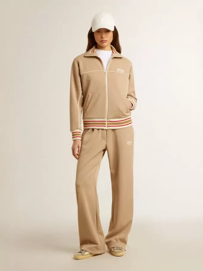 Ljusbeige joggingbyxor för damer med vitt logo Ljusbeige joggingbyxor för damer med vitt logo