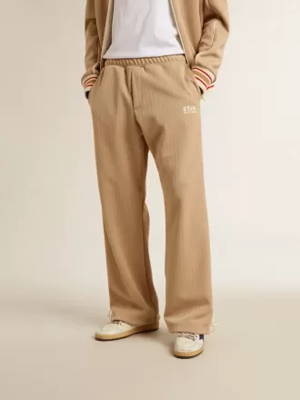 Ljusbeige joggingbyxor för herr med vitt logo