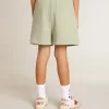 Ljusgröna shorts med vit stjärna