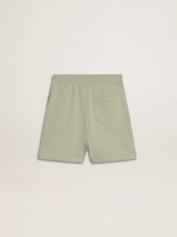 Ljusgröna shorts med vit stjärna
