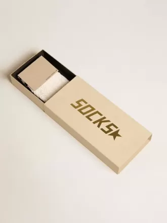 Långa ribbade strumpor i vintagevit med svart rand