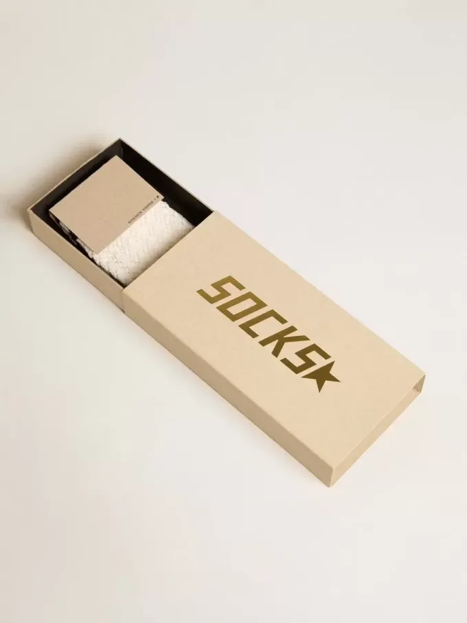Långa ribbade strumpor i vintagevit med svart rand