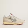 Marathon för damer med beige nylonöverdel och grå stjärna