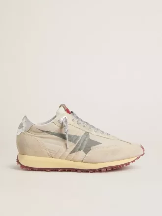 Marathon för damer med beige nylonöverdel och grå stjärna