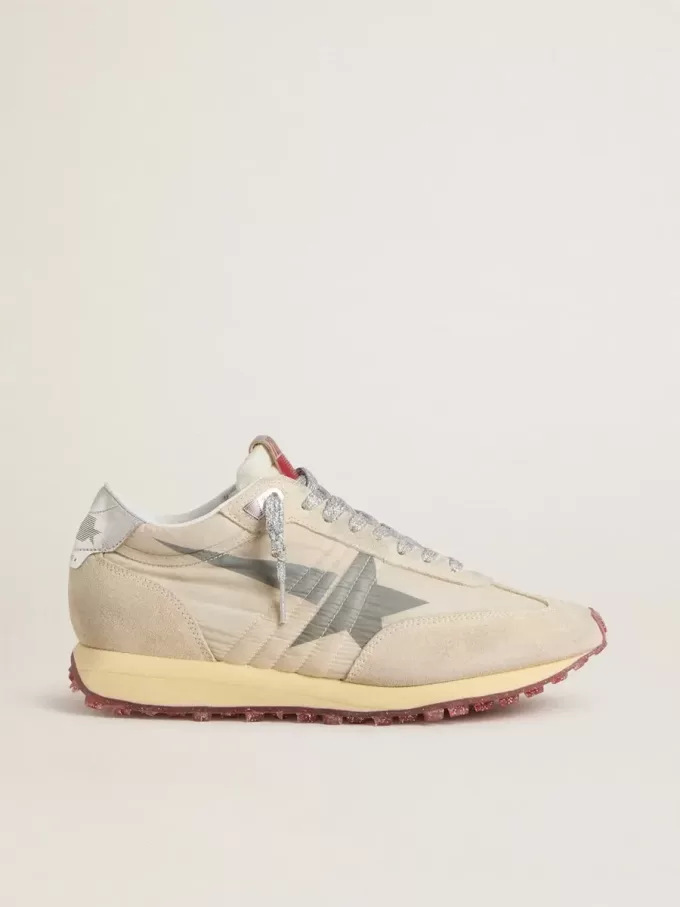 Marathon för damer med beige nylonöverdel och grå stjärna