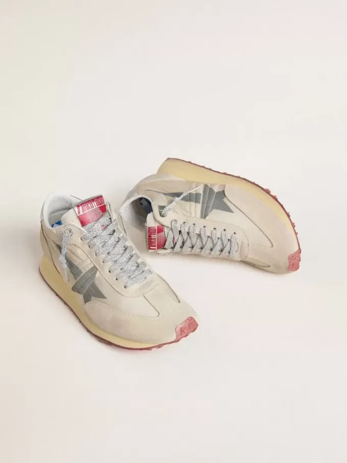 Marathon för damer med beige nylonöverdel och grå stjärna