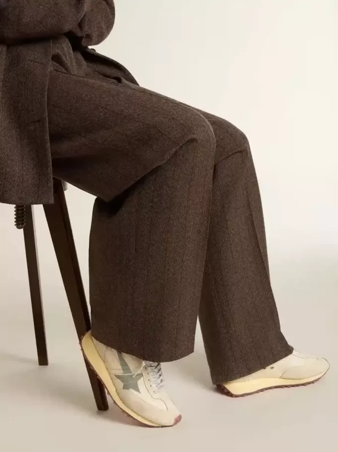Marathon för damer med beige nylonöverdel och grå stjärna