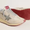 Marathon för damer med beige nylonöverdel och grå stjärna