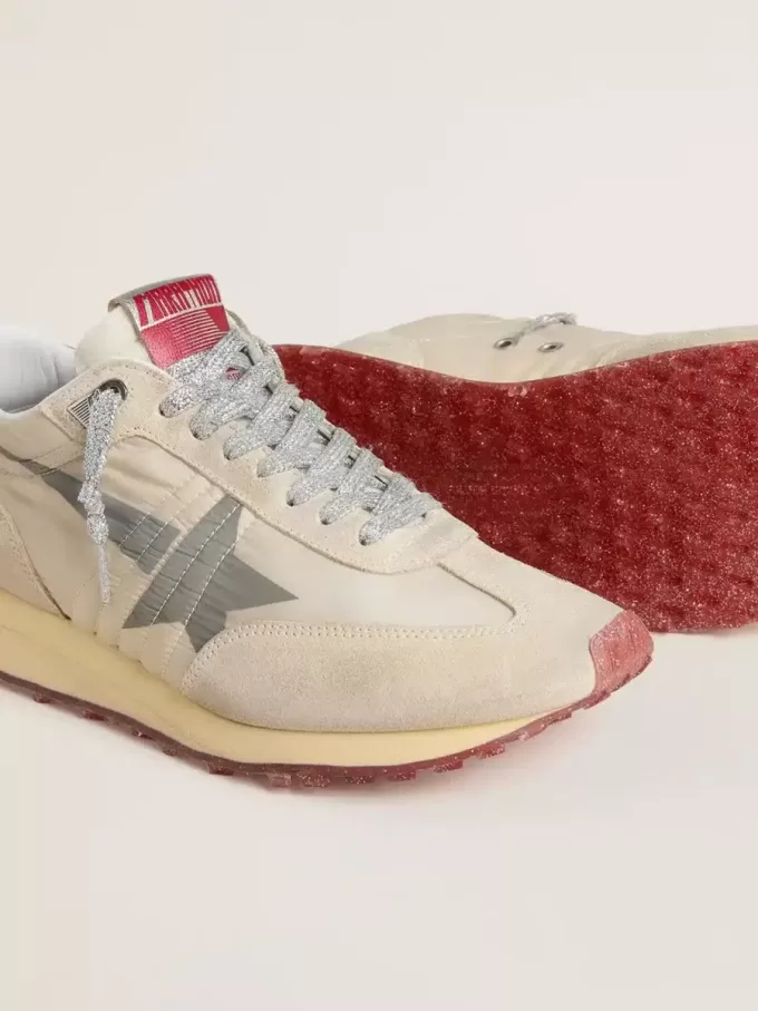 Marathon för damer med beige nylonöverdel och grå stjärna