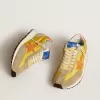 Marathon för damer med gul nylonöverdel och orange stjärna