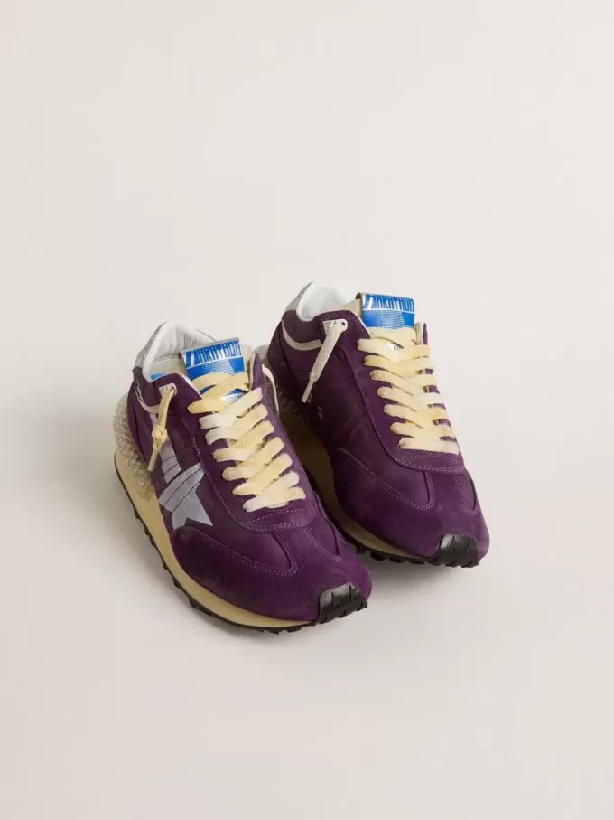 Marathon för damer med lila nylonöverdel och vit stjärna