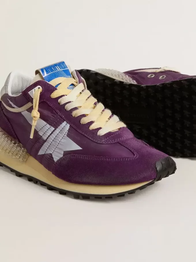 Marathon för damer med lila nylonöverdel och vit stjärna
